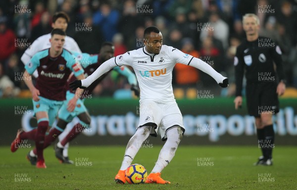 030318 - Swansea City v West Ham United, Premier League - Jordan Ayew of Swansea City takes penalty to score the fourth goal