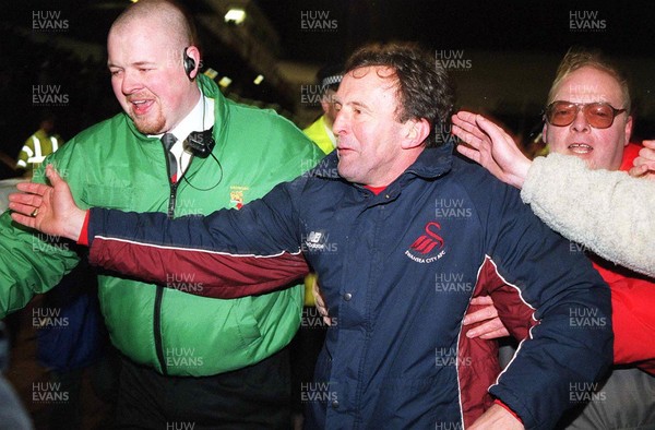 130199 - Swansea City v West Ham United - FA Cup Third Round Replay - Manager John Hollins celebrates at the end of the match