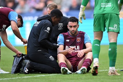 171026 - Swansea City v West Ham United - Sky Bet Championship - Max Kilman of West Ham goes down injured