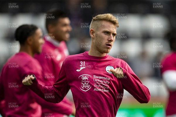 051122 - Swansea City v Wigan Athletic - Sky Bet Championship - Ollie Cooper of Swansea City during the warm up