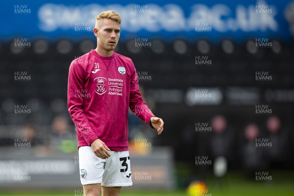 051122 - Swansea City v Wigan Athletic - Sky Bet Championship - Ollie Cooper of Swansea City during the warm up