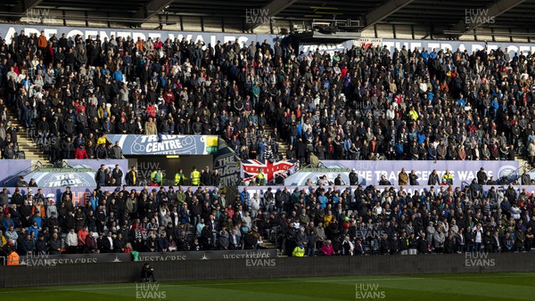 051122 - Swansea City v Wigan Athletic - Sky Bet Championship - Swansea City supporters observe a minutes silence