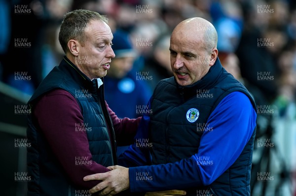 180120 - Swansea City v Wigan Athletic, SkyBet Championship - Swansea Manager, Steve Cooper and Wigan Manager, Paul Cook greet each other ahead of kick off 