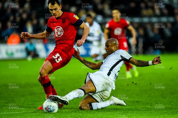 180120 - Swansea City v Wigan Athletic, SkyBet Championship - Andre Ayew of Swansea City tries to slide the ball through