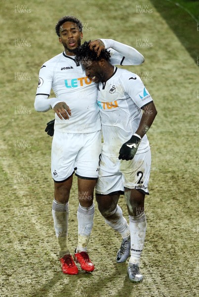 170118 - Swansea City v Wolverhampton Wanderers - FA Cup Replay - Wilfried Bony of Swansea City celebrates scoring a goal with Leroy Fer