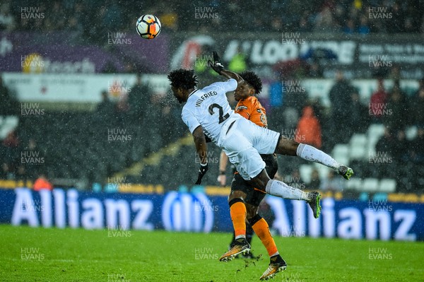 170118 - Swansea City v Wolverhampton Wonderers, FA CUP Replay -Wilfried Bony of Swansea City jumps for the ball 