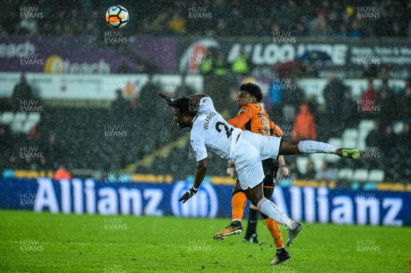 170118 - Swansea City v Wolverhampton Wonderers, FA CUP Replay -Wilfried Bony of Swansea City jumps for the ball 