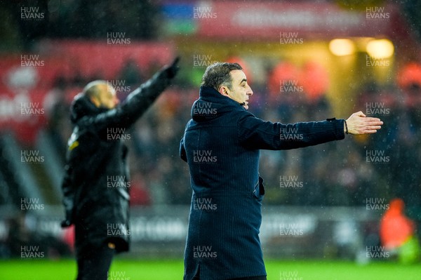170118 - Swansea City v Wolverhampton Wonderers, FA CUP Replay - ( L-R ) Wolves Manager Nuno and Swansea Manager Carlos Carvalhal gesture during the game 
