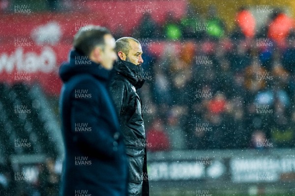 170118 - Swansea City v Wolverhampton Wonderers, FA CUP Replay - ( L-R ) Wolves Manager Nuno and Swansea Manager Carlos Carvalhal look on during the game 
