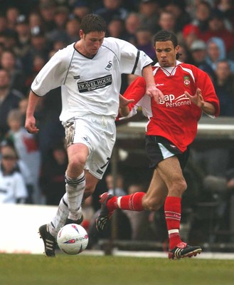 010203 - Swansea City v Wrexham - Third Division - Swansea's Andrew Mumford gets past Carlos Edwards