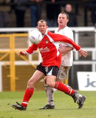 010203 - Swansea City v Wrexham - Third Division - Wrexham's Andy Morell clears as David O'Leary challenges