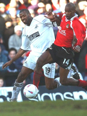 010203 - Swansea City v Wrexham - Third Division - Swansea's John Williams is beaten to the ball by Paul Edwards