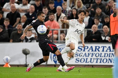 050926 - Swansea City v Wrexham - Sky Bet Championship - Eom Ji-Sung of Swansea City puts a ball into the box