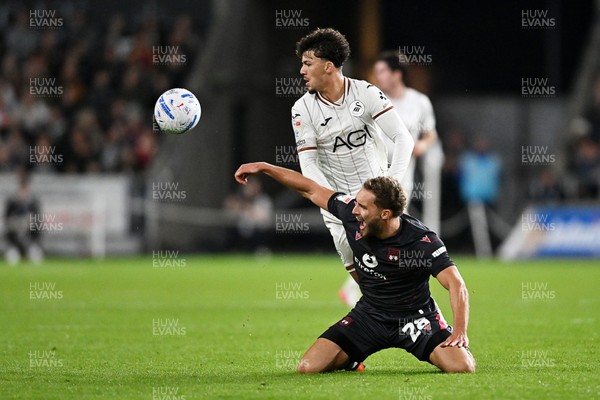 050926 - Swansea City v Wrexham - Sky Bet Championship - Filip Lissah of Swansea City is challenged by Sam Smith of Wrexham