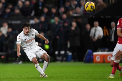 191225 - Swansea City v Wrexham - Sky Bet Championship - Goncalo Franco of Swansea City has a shot from distance