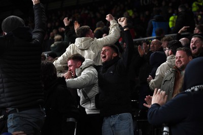 191225 - Swansea City v Wrexham - Sky Bet Championship - Swansea fans celebrate after Zan Vipotnik of Swansea City scores the equalising goal