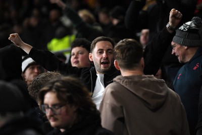 191225 - Swansea City v Wrexham - Sky Bet Championship - Swansea fans celebrate after Zan Vipotnik of Swansea City scores the equalising goal