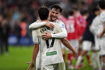 191225 - Swansea City v Wrexham - Sky Bet Championship - Liam Cullen of Swansea City celebrates the win at full time with Goncalo Franco of Swansea City