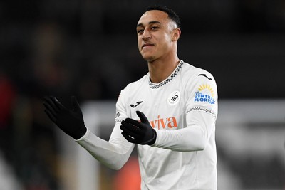 191225 - Swansea City v Wrexham - Sky Bet Championship - Adam Idah of Swansea City celebrates the win at full time