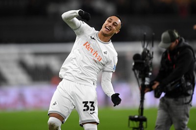 191225 - Swansea City v Wrexham - Sky Bet Championship - Adam Idah of Swansea City celebrates the win at full time
