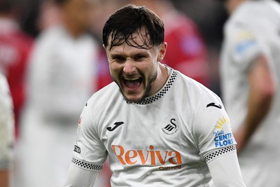 191225 - Swansea City v Wrexham - Sky Bet Championship - Liam Cullen of Swansea City celebrates the win at full time