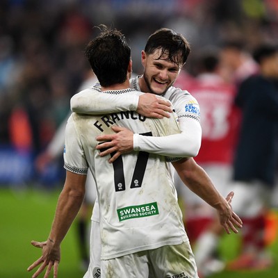 191225 - Swansea City v Wrexham - Sky Bet Championship - Liam Cullen of Swansea City and Goncalo Franco of Swansea City celebrate the win at full time