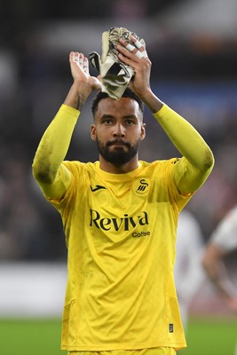 191225 - Swansea City v Wrexham - Sky Bet Championship - Lawrence Vigouroux of Swansea City celebrates the win at full time