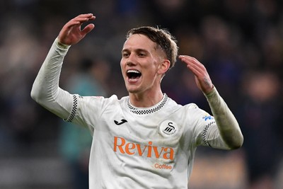 191225 - Swansea City v Wrexham - Sky Bet Championship - Ethan Galbraith of Swansea City celebrates the win at full time