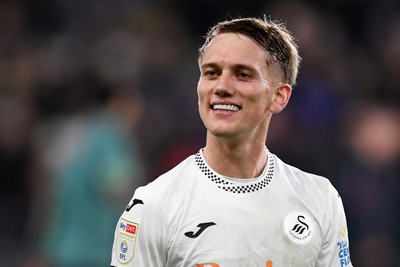 191225 - Swansea City v Wrexham - Sky Bet Championship - Ethan Galbraith of Swansea City celebrates the win at full time