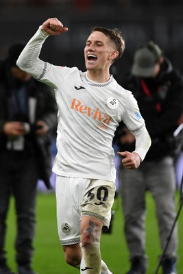 191225 - Swansea City v Wrexham - Sky Bet Championship - Ethan Galbraith of Swansea City celebrates the win at full time