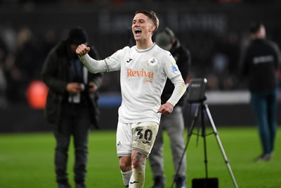 191225 - Swansea City v Wrexham - Sky Bet Championship - Ethan Galbraith of Swansea City celebrates the win at full time