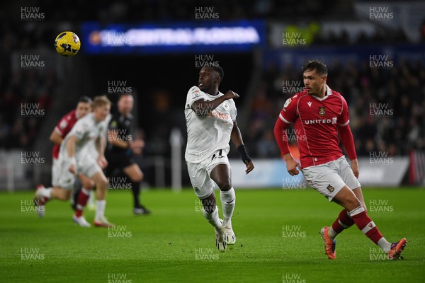 191225 - Swansea City v Wrexham - Sky Bet Championship - Zeidane Inoussa of Swansea City chases after the ball