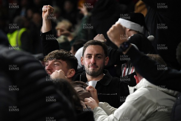 191225 - Swansea City v Wrexham - Sky Bet Championship - Swansea fans celebrate after Zan Vipotnik of Swansea City scores the equalising goal