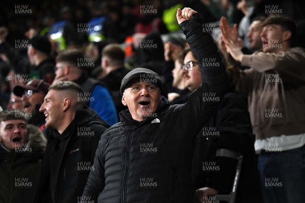 191225 - Swansea City v Wrexham - Sky Bet Championship - Swansea fans celebrate after Zan Vipotnik of Swansea City scores the equalising goal