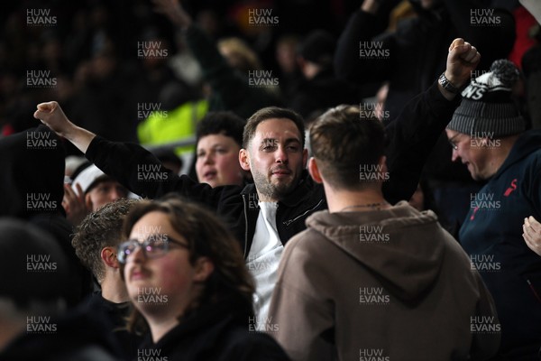 191225 - Swansea City v Wrexham - Sky Bet Championship - Swansea fans celebrate after Zan Vipotnik of Swansea City scores the equalising goal