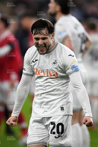191225 - Swansea City v Wrexham - Sky Bet Championship - Liam Cullen of Swansea City celebrates the win at full time