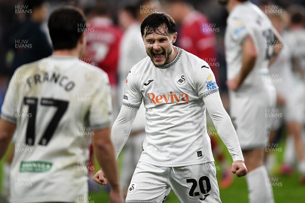 191225 - Swansea City v Wrexham - Sky Bet Championship - Liam Cullen of Swansea City celebrates the win at full time