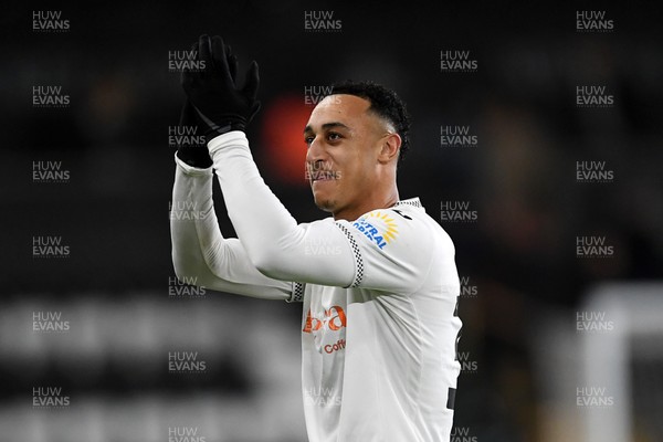 191225 - Swansea City v Wrexham - Sky Bet Championship - Adam Idah of Swansea City celebrates the win at full time