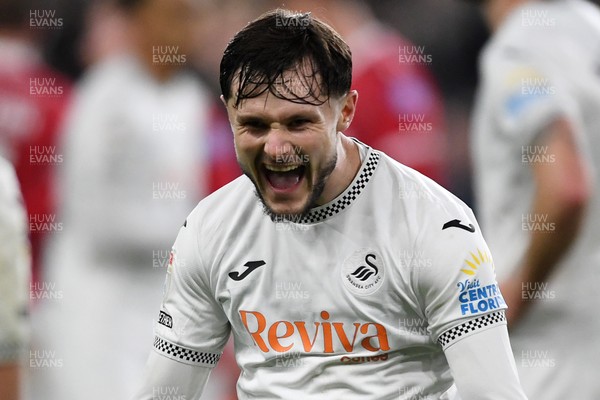 191225 - Swansea City v Wrexham - Sky Bet Championship - Liam Cullen of Swansea City celebrates the win at full time