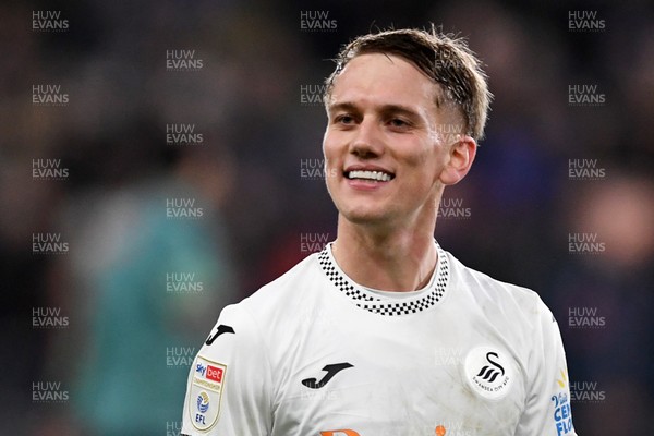 191225 - Swansea City v Wrexham - Sky Bet Championship - Ethan Galbraith of Swansea City celebrates the win at full time