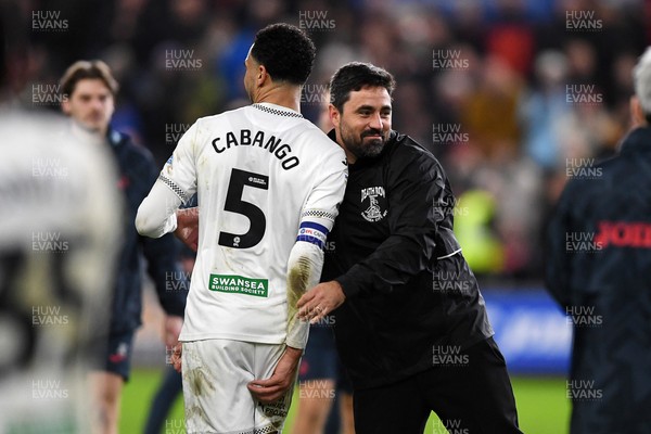 191225 - Swansea City v Wrexham - Sky Bet Championship - Vitor Matos, Swansea Head Coach celebrates the win at full time with Ben Cabango of Swansea City
