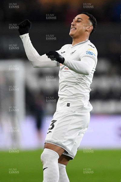 191225 - Swansea City v Wrexham - Sky Bet Championship - Adam Idah of Swansea City celebrates the win at full time