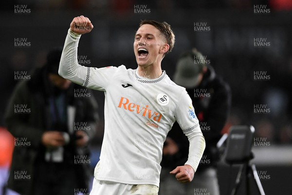 191225 - Swansea City v Wrexham - Sky Bet Championship - Ethan Galbraith of Swansea City celebrates the win at full time