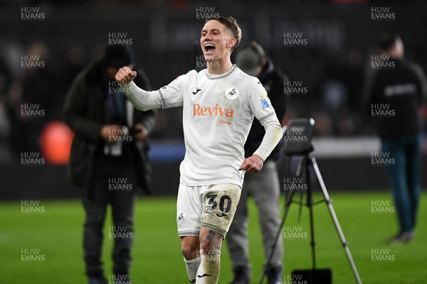 191225 - Swansea City v Wrexham - Sky Bet Championship - Ethan Galbraith of Swansea City celebrates the win at full time