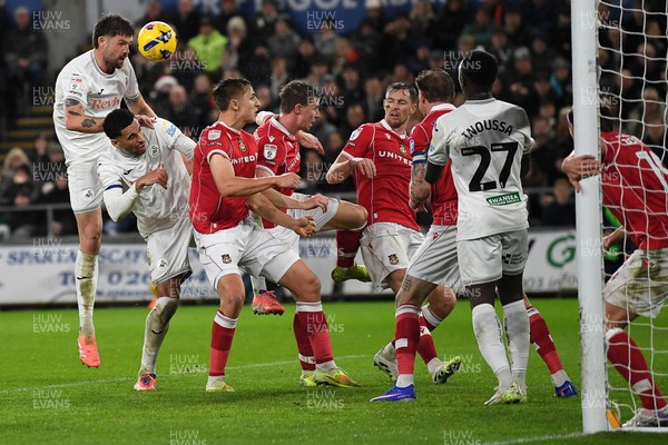 191225 - Swansea City v Wrexham - Sky Bet Championship - Cameron Burgess of Swansea City heads at goal
