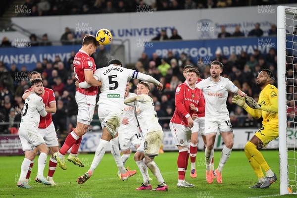 191225 - Swansea City v Wrexham - Sky Bet Championship - Max Cleworth of Wrexham heads at goal