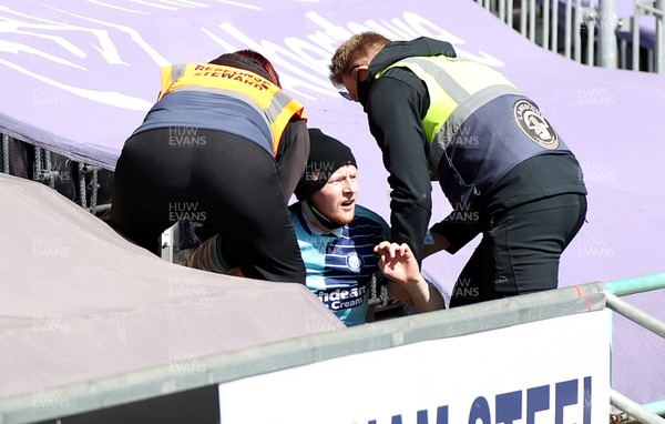 170421 - Swansea City - Wycombe Wanderers - SkyBet Championship - A fan wearing a Wycombe shirt sneaks into the stadium and tries to go on the pitch before being removed by stewards
