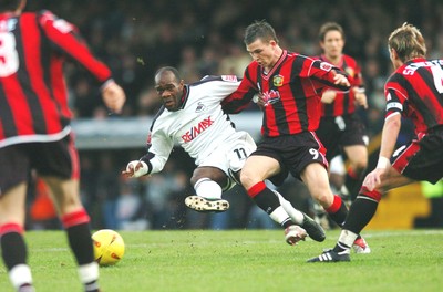 010105 - Swansea City v Yeovil Town - Swansea's Adrian Forbes tangles with Kevin Gall