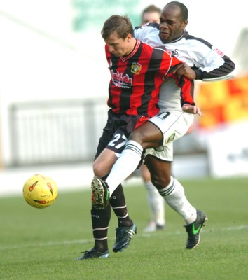 010105 - Swansea City v Yeovil Town - Swansea's Adrian Forbes hassles Andrejs Stolcers for posession