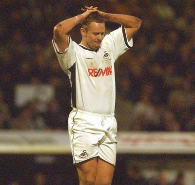 010105 - Swansea City v Yeovil Town - Swansea's Lee Trundle shows his emotions as his shot goes over the bar